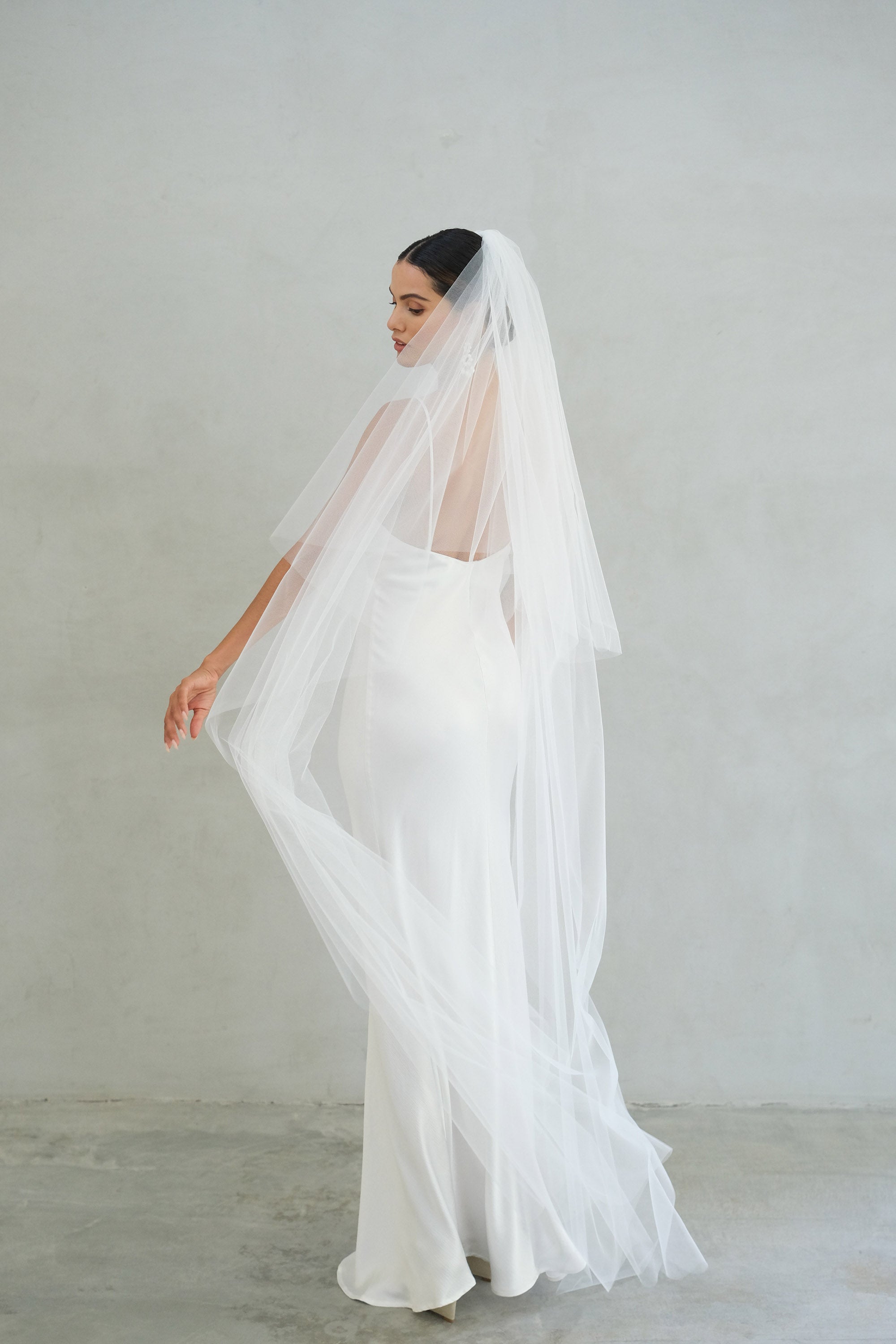 https://www.madametulle.com.au/cdn/shop/files/Alexa-II-two-tier-wedding-veil-with-blusher-madame-tulle-bridal-sydney-australia-05_2000x.jpg?v=1698565285