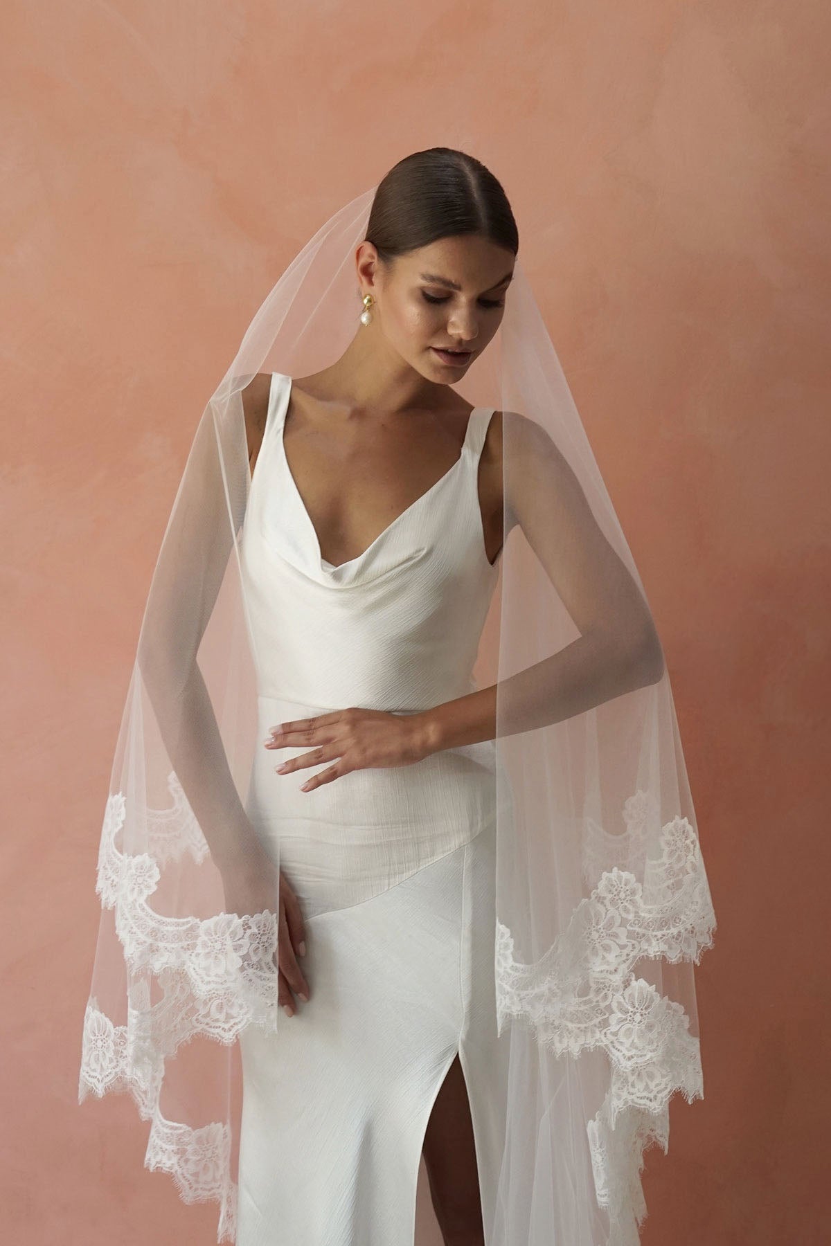 https://www.madametulle.com.au/cdn/shop/products/Colette-II-lace-two-tier-wedding-veil-madame-tulle-australia-03_2000x.jpg?v=1663830855