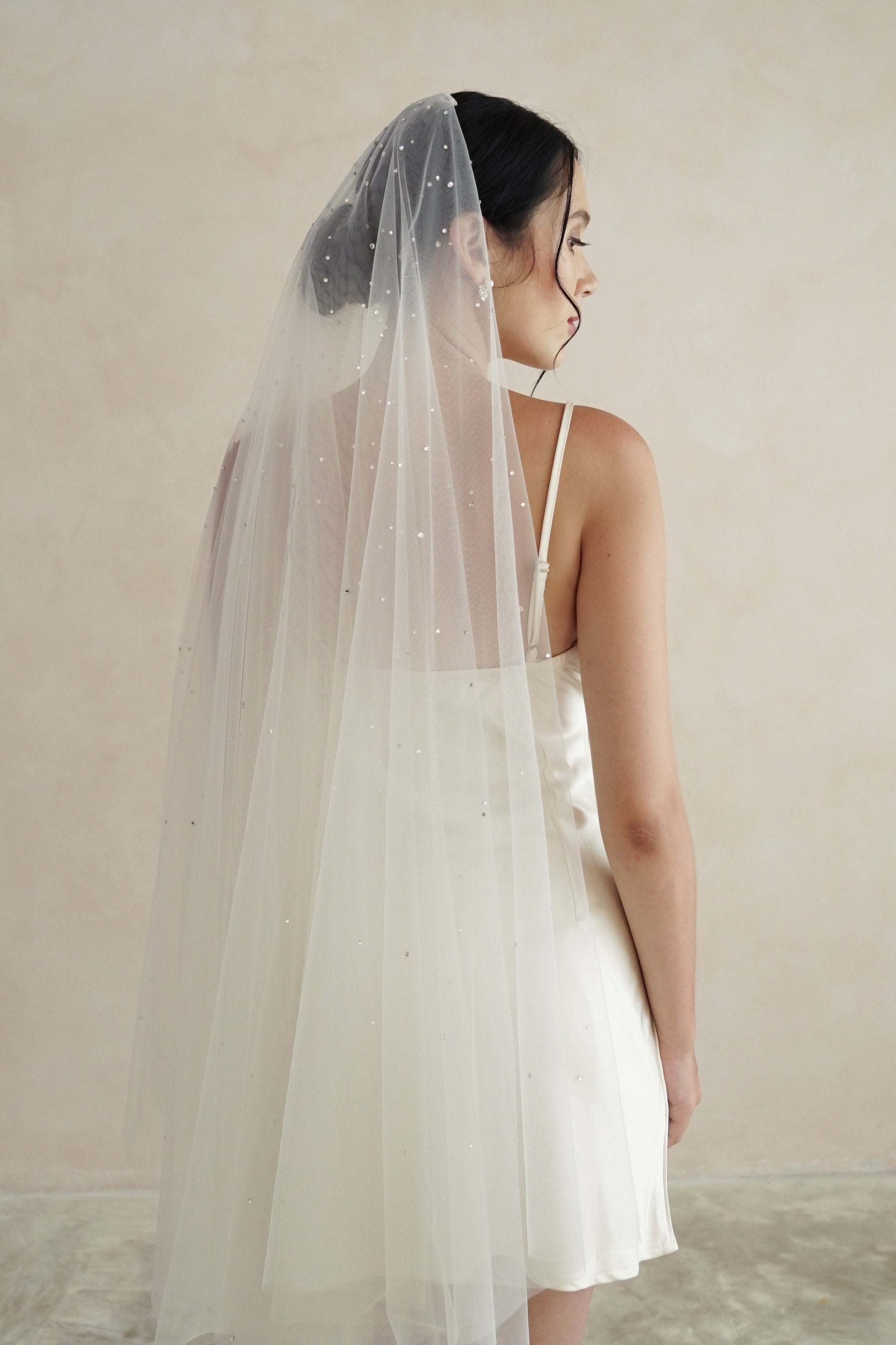 https://www.madametulle.com.au/cdn/shop/products/Crystal-wedding-veil-madame-tulle-bridal-australia-03_2000x.jpg?v=1640738342